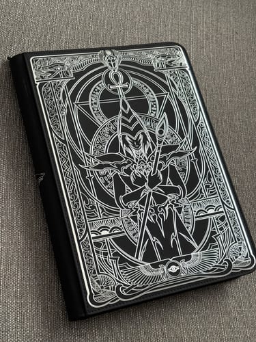 Customer photo review of The Darkest Magician 9-Pocket Trading Card Binder