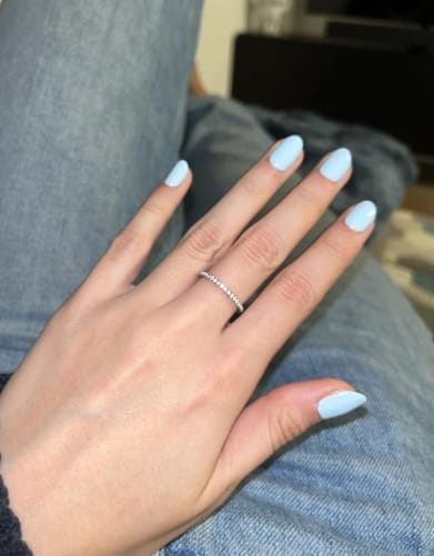 Customer photo review of S925 Half Halo Moissanite 0.5 Ct Round Cut White/Green Stone Anniversary Ring