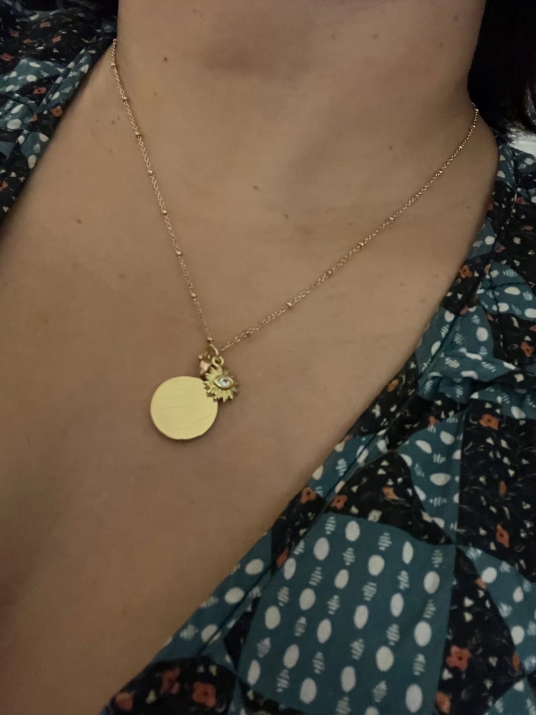 Customer photo review of Sunburst Evil Eye Charm – Trust Your Inner Light