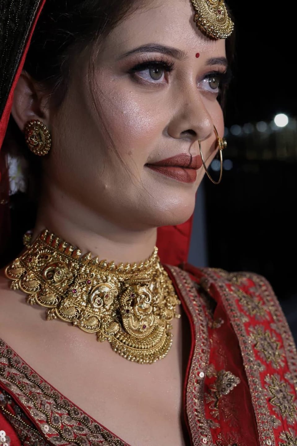 Customer photo review of Ganpatiji motif center broad choker set with peacock design and hanging bead detailing