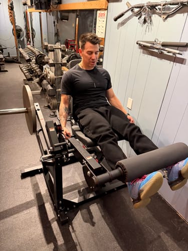 Customer photo review of TAWERET™  1:1 Cable Ratio Leg Extension and Curl Machine