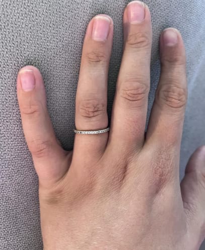 Customer photo review of S925 Half Halo Moissanite 0.5 Ct Round Cut White/Green Stone Anniversary Ring