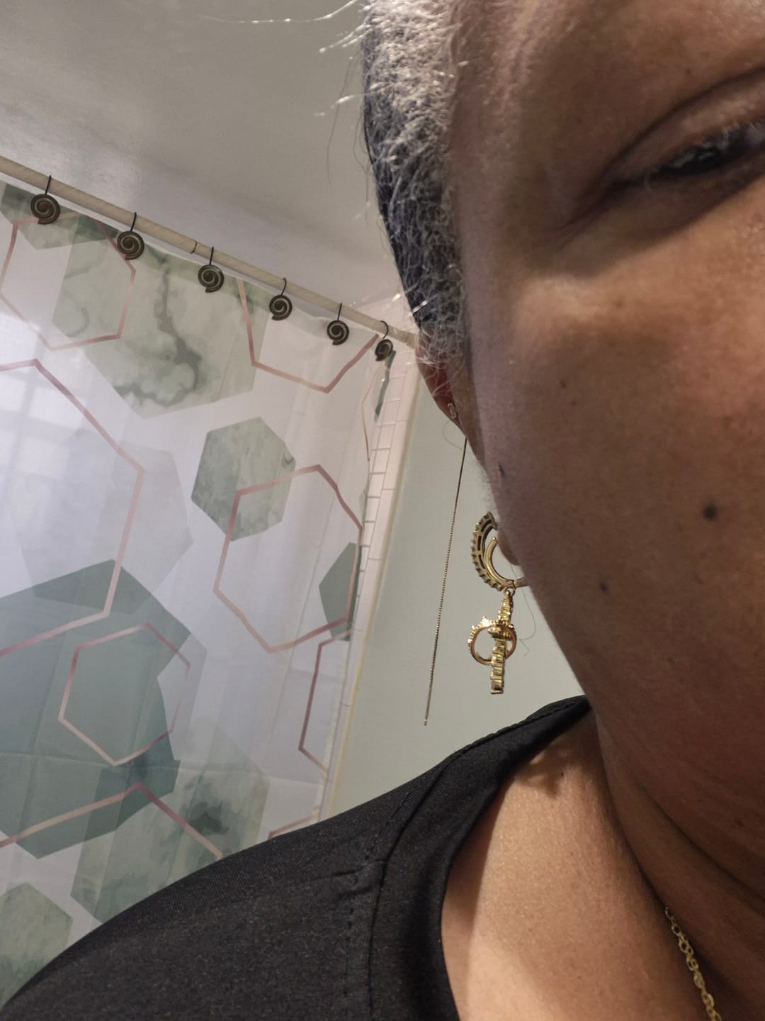 Customer photo review of Christianartworkshop Modern Crowned in Faith Cross Necklace, Earrings