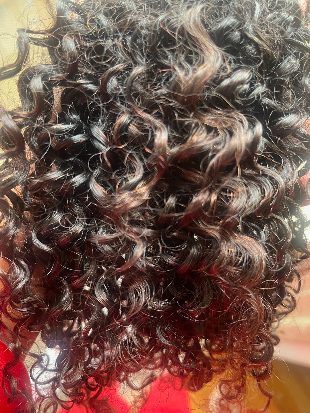 Customer photo review of Brazilian Curly Bundle