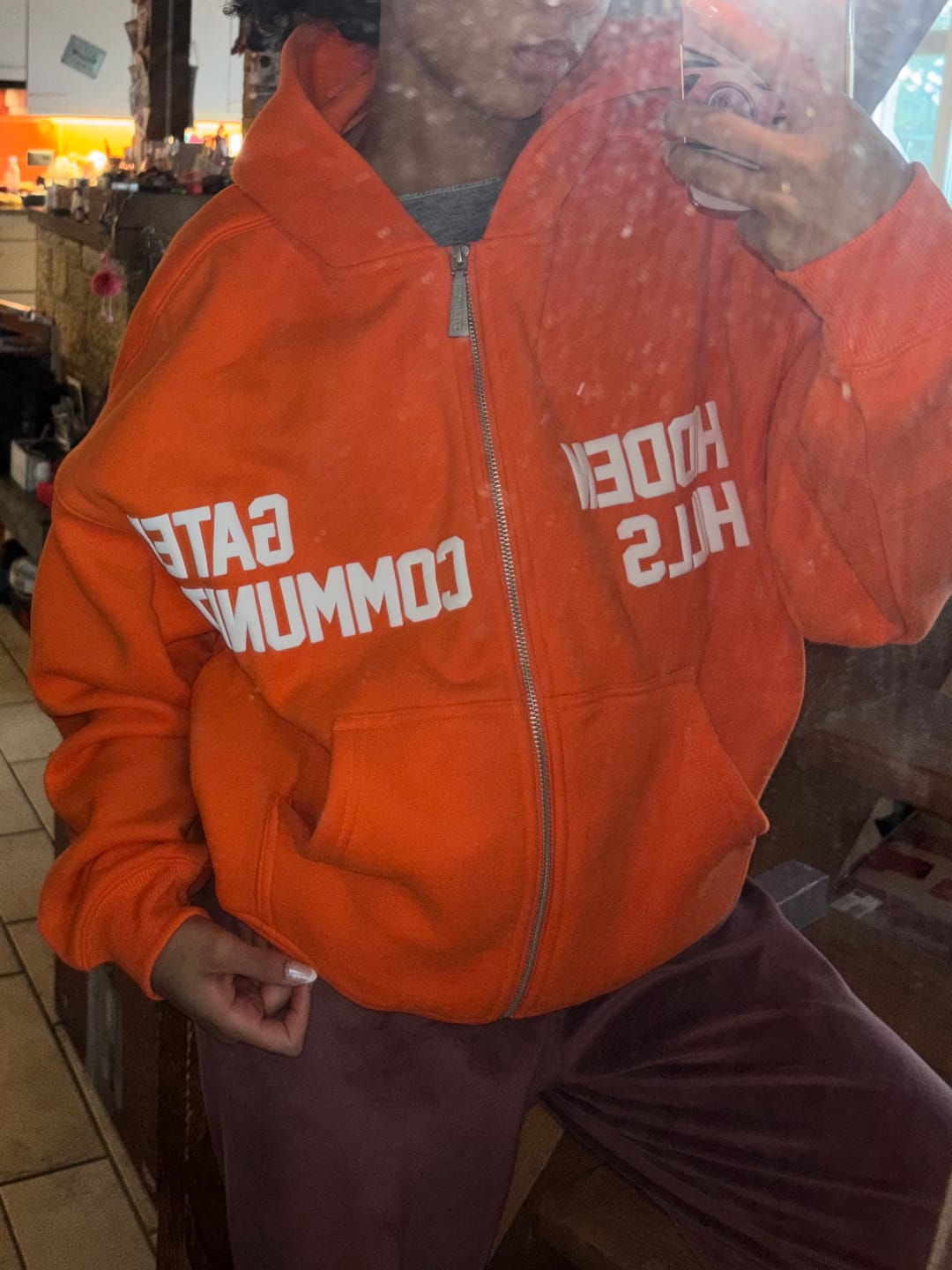 Customer photo review of GATED COMMUNITY ZIP HOODIE ORANGE