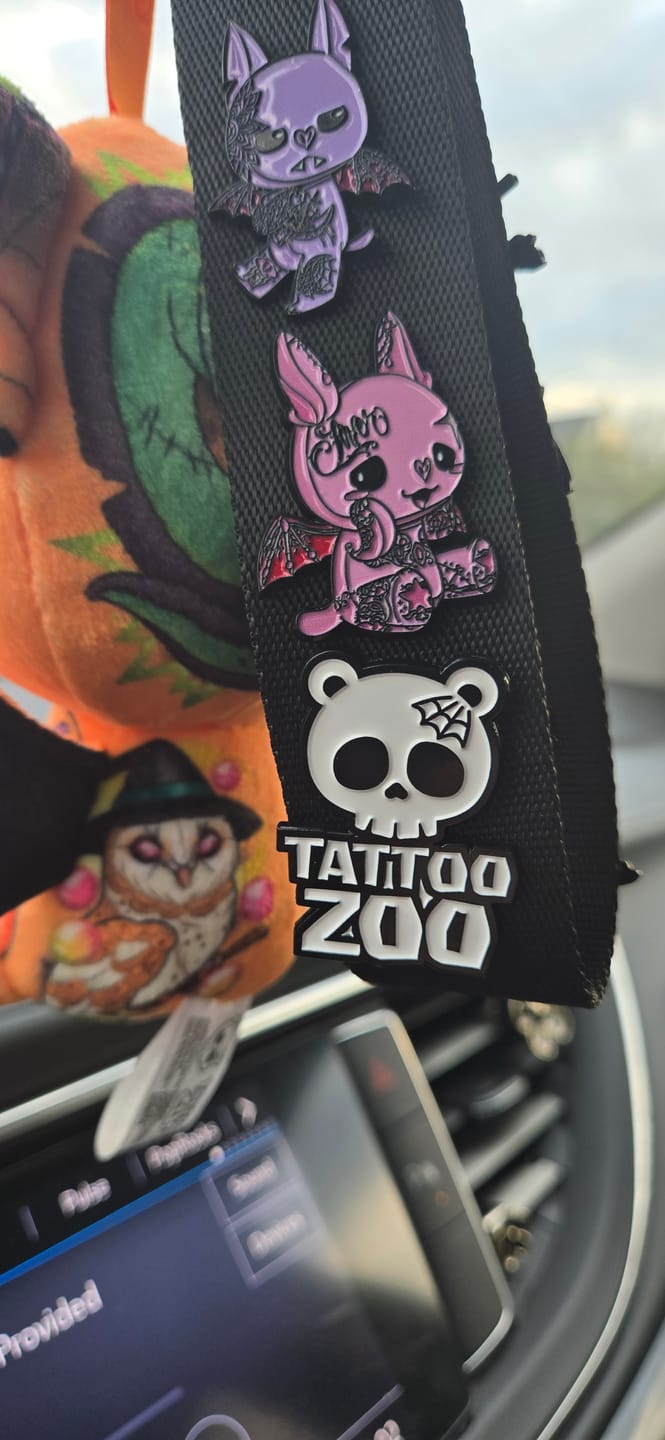 Customer photo review of Tattoo Zoo Logo 2 Enamel Pin