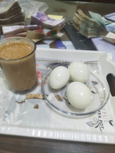 Customer's breakfast tray with three hard-boiled eggs, made using the electric boiler.