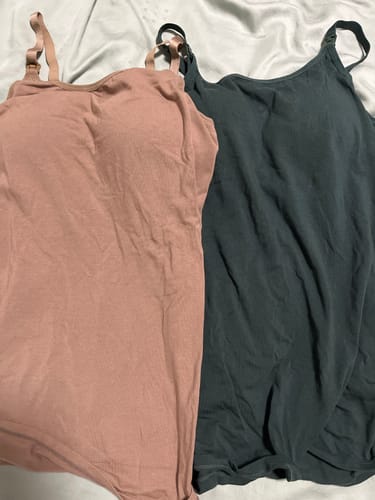 Customer's pink and dark grey Ellie Cruz Nursing Camisoles laid flat, showing the built-in bra and nursing straps.