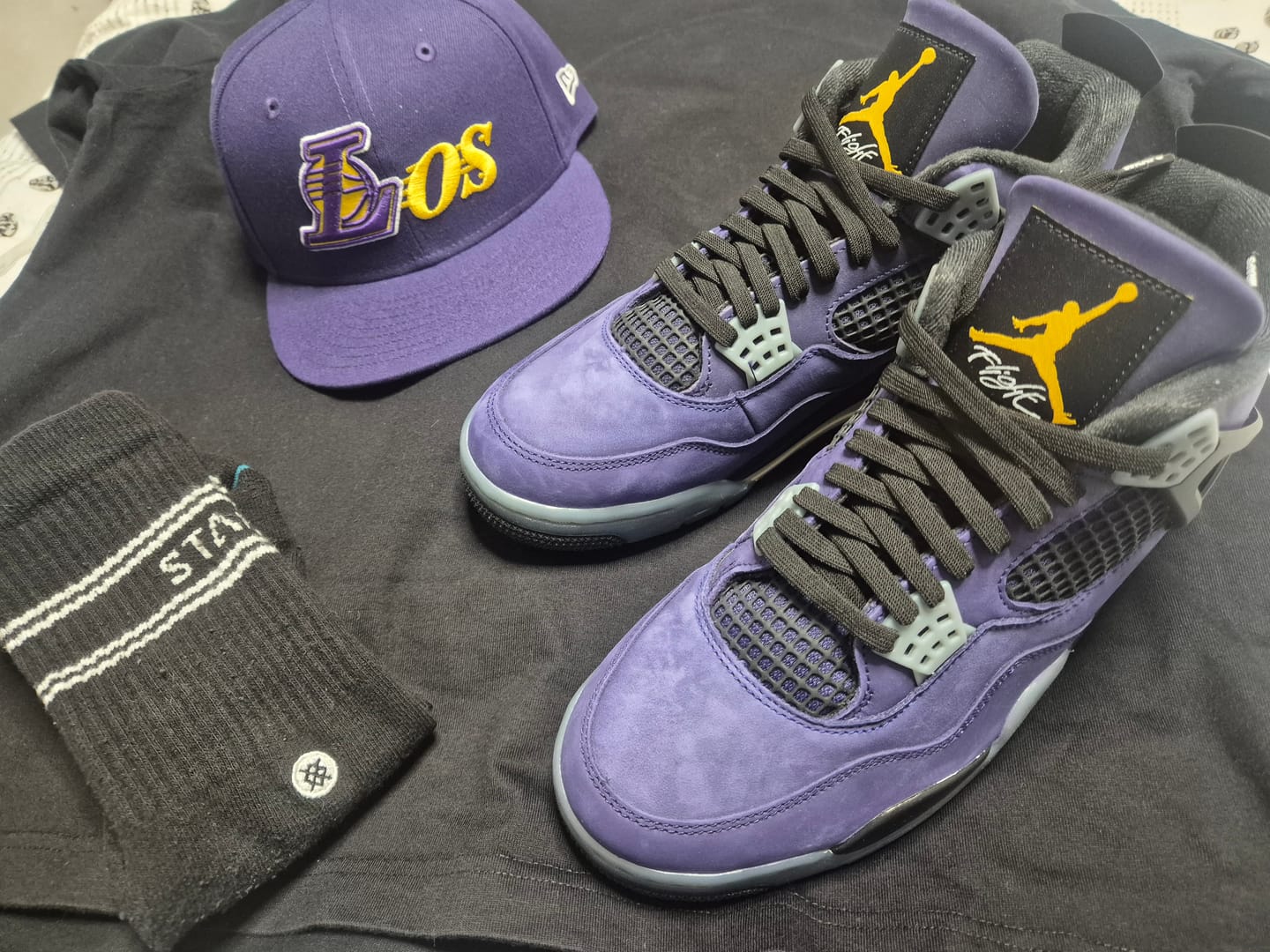 Customer photo review of Air Jordan 4 Imperial Purple "Lakers"