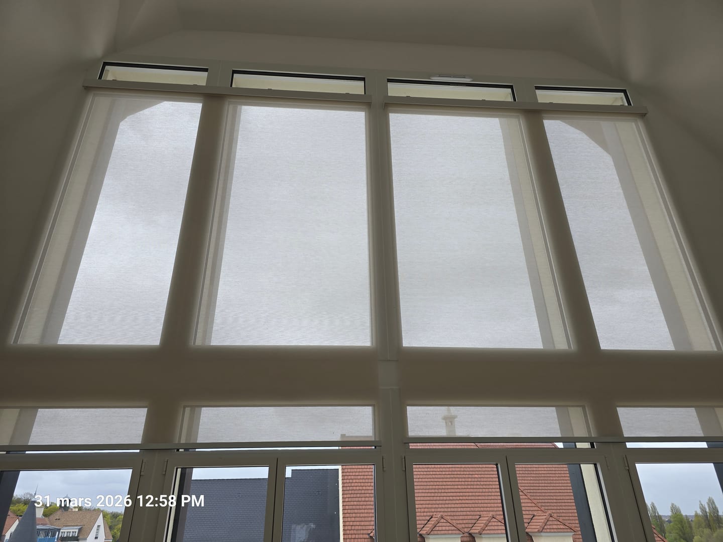 Customer photo review of SmartWings Motorized Light Filtering Roller Shades 50% Blackout PVC Free Sunscreen