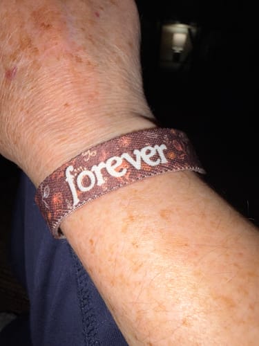 Customer showing a close-up of their 'Forever' bracelet from the Women's Bible Pack on their wrist.