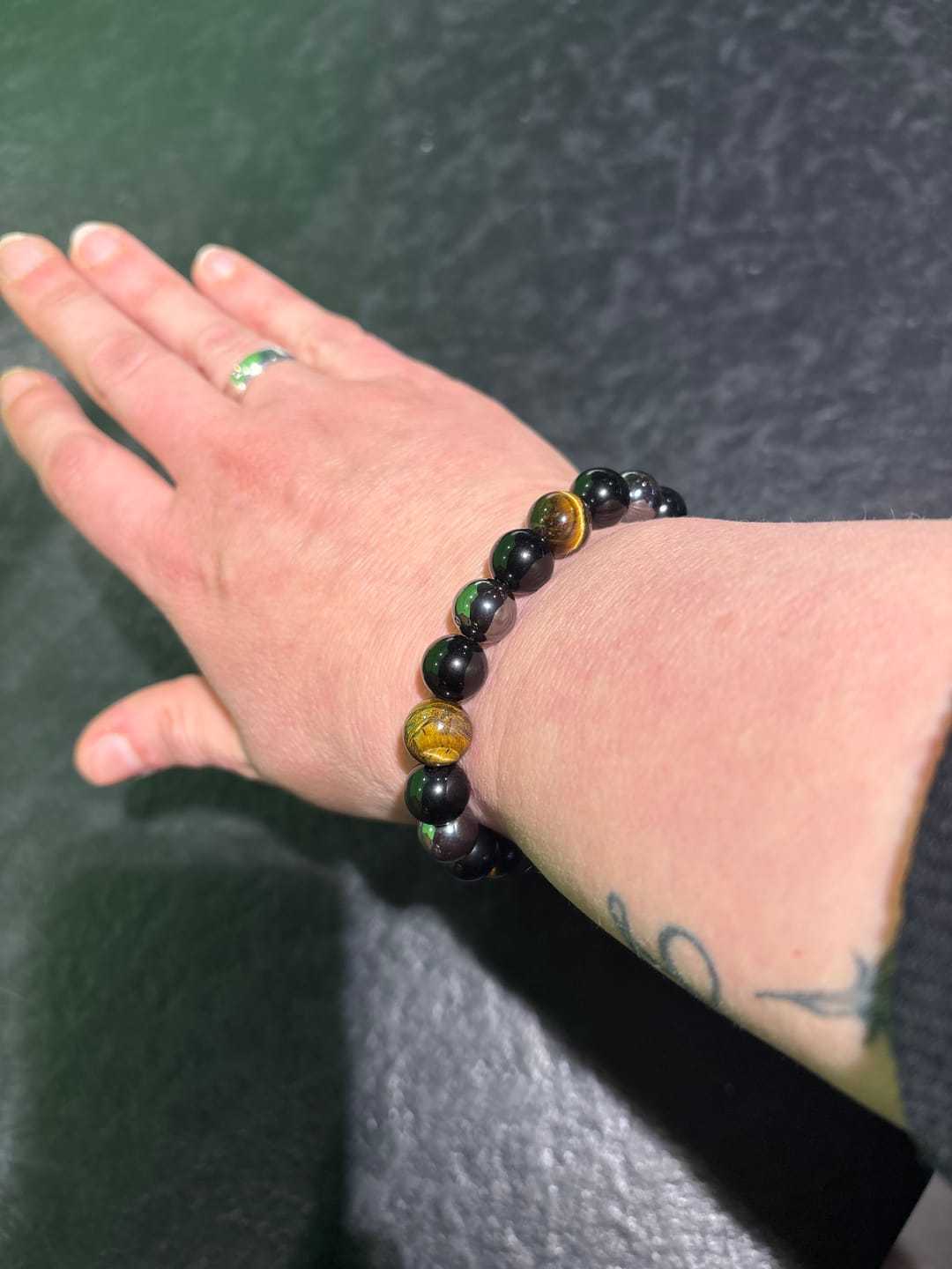 Customer photo review of DREIFACHER SCHÜTZER Tigerauge - Hämatit - Schwarzer Obsidian