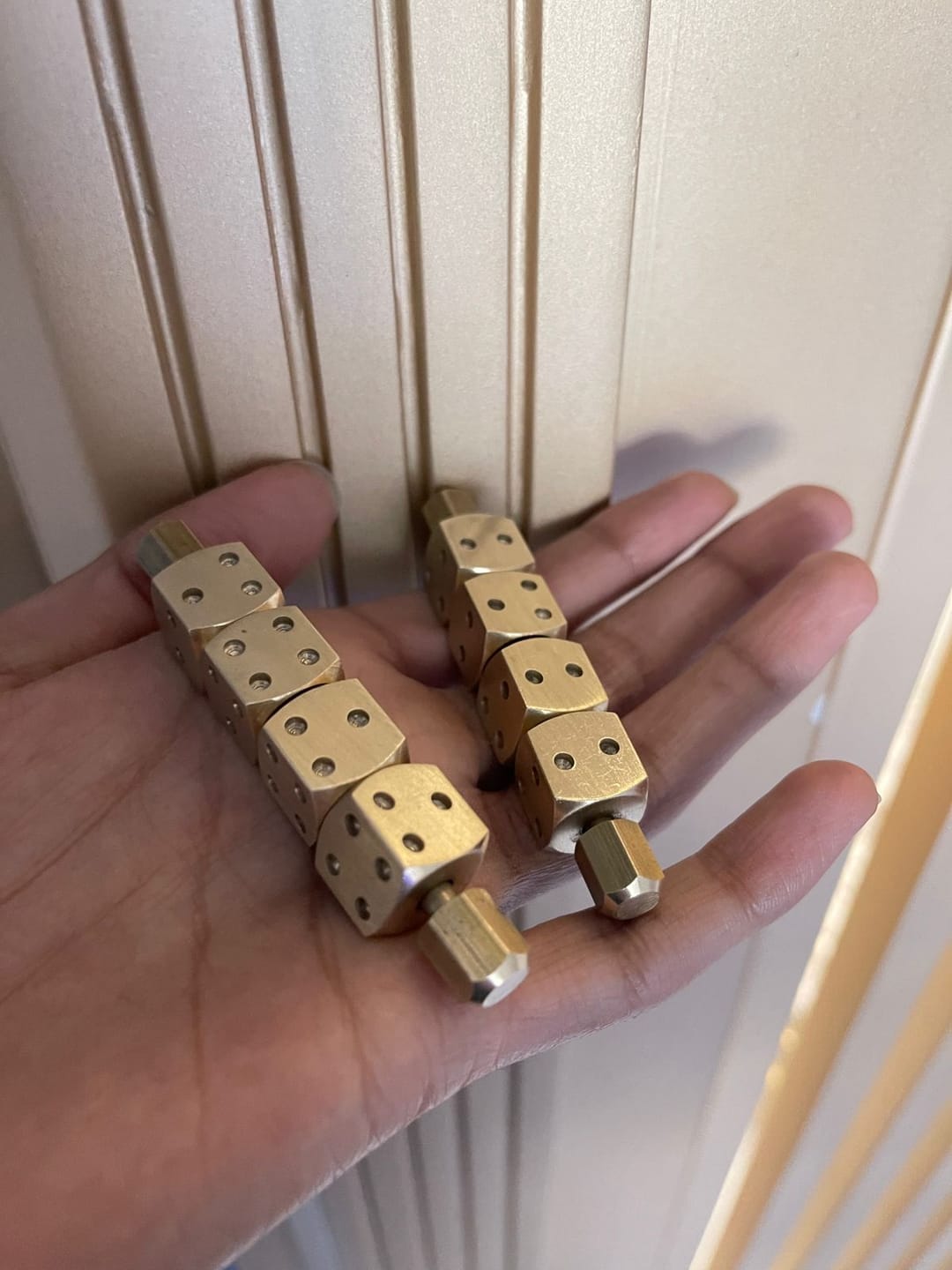Customer photo review of Brass Ramal Pass Dice – Vastu Remedy for Divination & Spiritual Consulting | Ideal for Astrology Readings & Vastu Analysis | 8 cm x 1.4 cm x 1.4 cm | 200 g