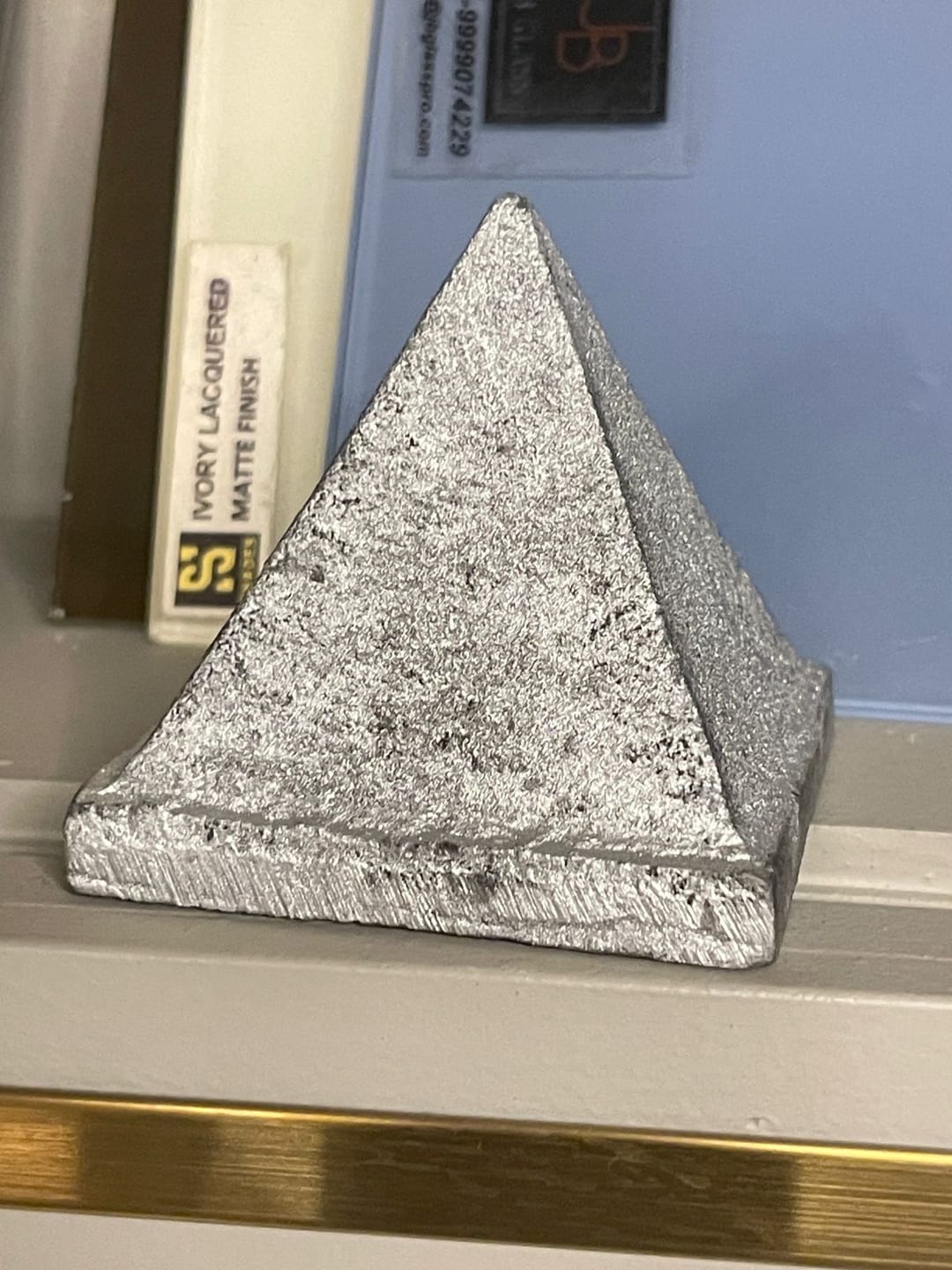 Customer photo review of Solid Iron Metal Pyramid Vastu Remedy for West Direction and Brahmasthan Balance, Mental Focus, Career Success and Positive Energy Correction | 7.6 cm | 800 g