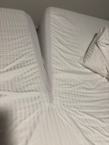 Customer photo review of CinchFit American Made Split Top King  & Cal King Sheets - No Tear 600TC Cotton Stripe Cord Elastic Sheets