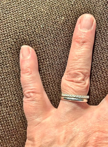 Customer photo review of Moissanite Round Half Eternity Sterling Silver Wedding Band Stackable Ring