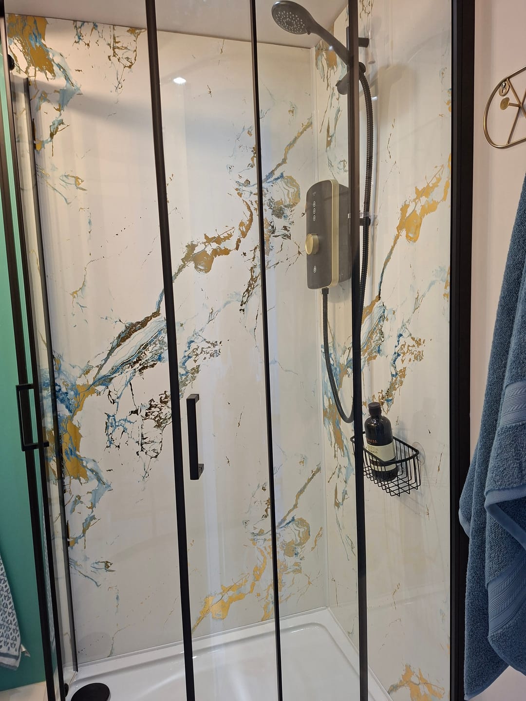 Customer photo review of 10mm Oro Blue Gloss Shower Panel 1M x 2.4M