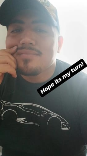 Reviewer wearing the black 80Eighty® DCG #86 Shirt, showing the white outline graphic of a sports car.