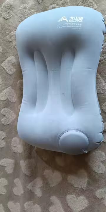 Customer photo review of Ultralight Press-to-Inflate Camping Travel Pillow