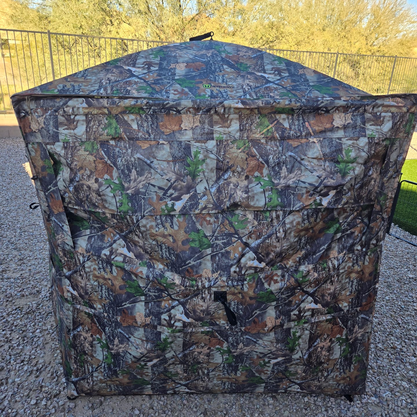 Customer photo review of Vis360 See Through Ground Blind | 360° Camouflage Pop Up Hunting Blind for 2/3/4 Person | Portable Deer Blind with Orange Cover