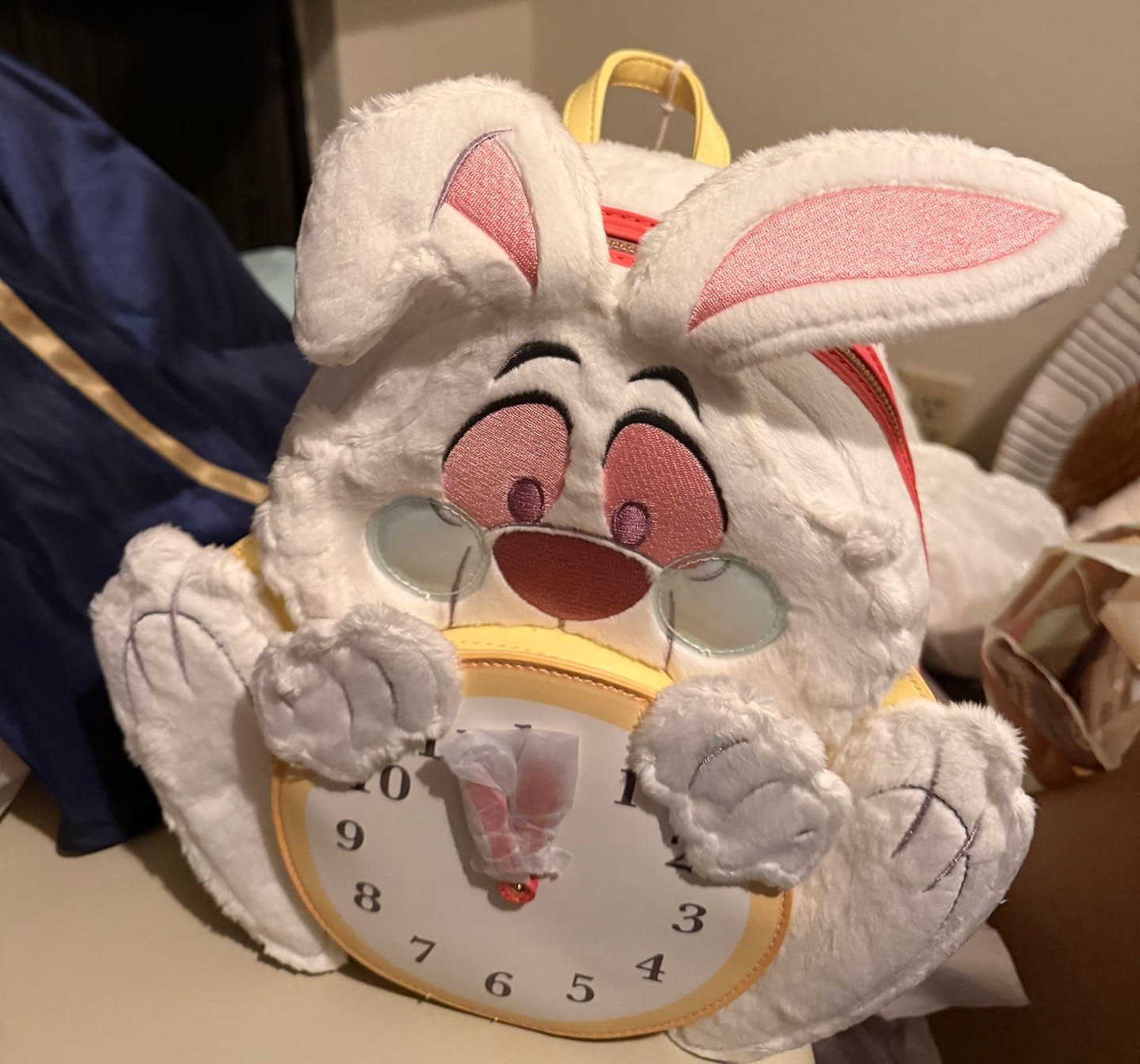 Customer photo review of Loungefly Disney Alice in Wonderland White Rabbit Cosplay Mini Backpack