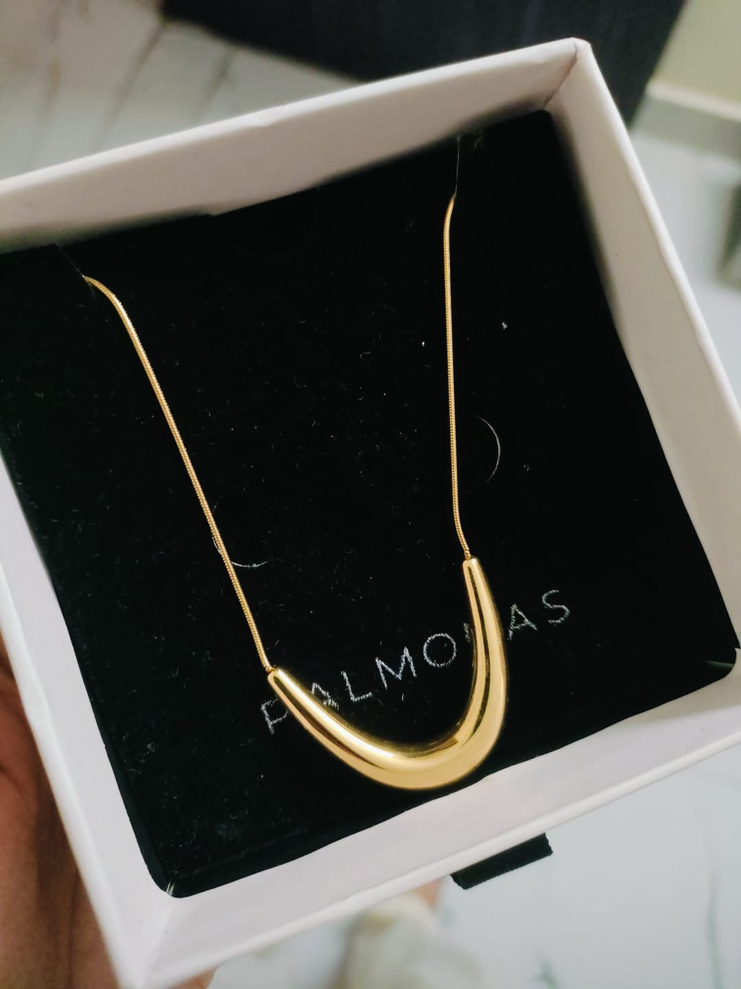Customer photo review of Golden Boomerang Necklace