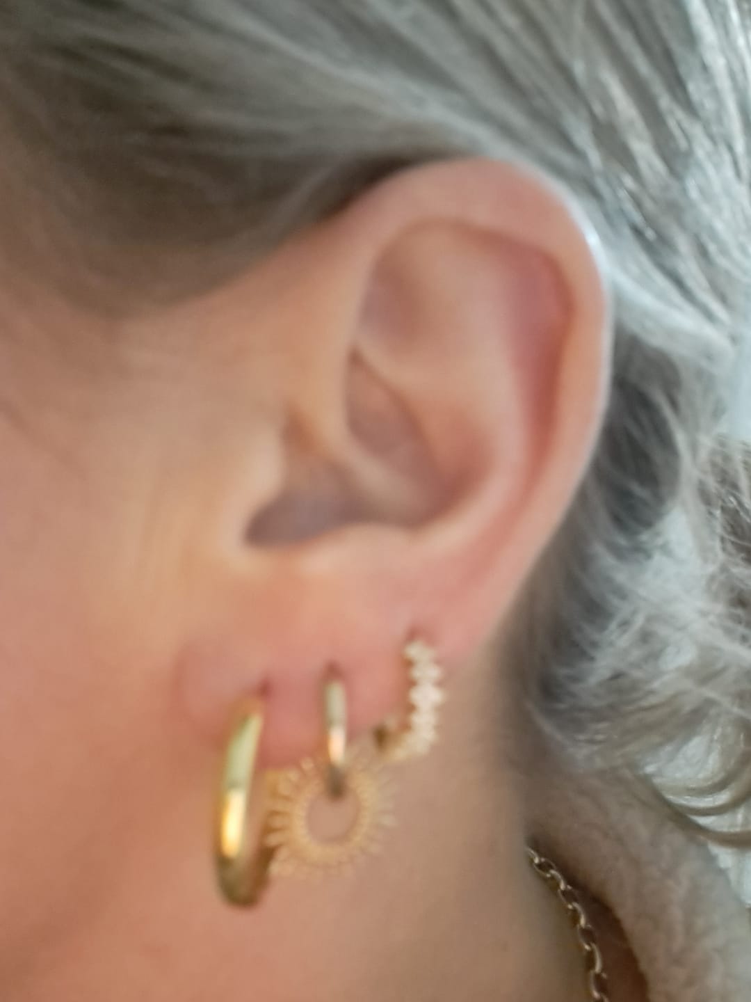 Customer photo review of Medium Bold Hoops in Gold