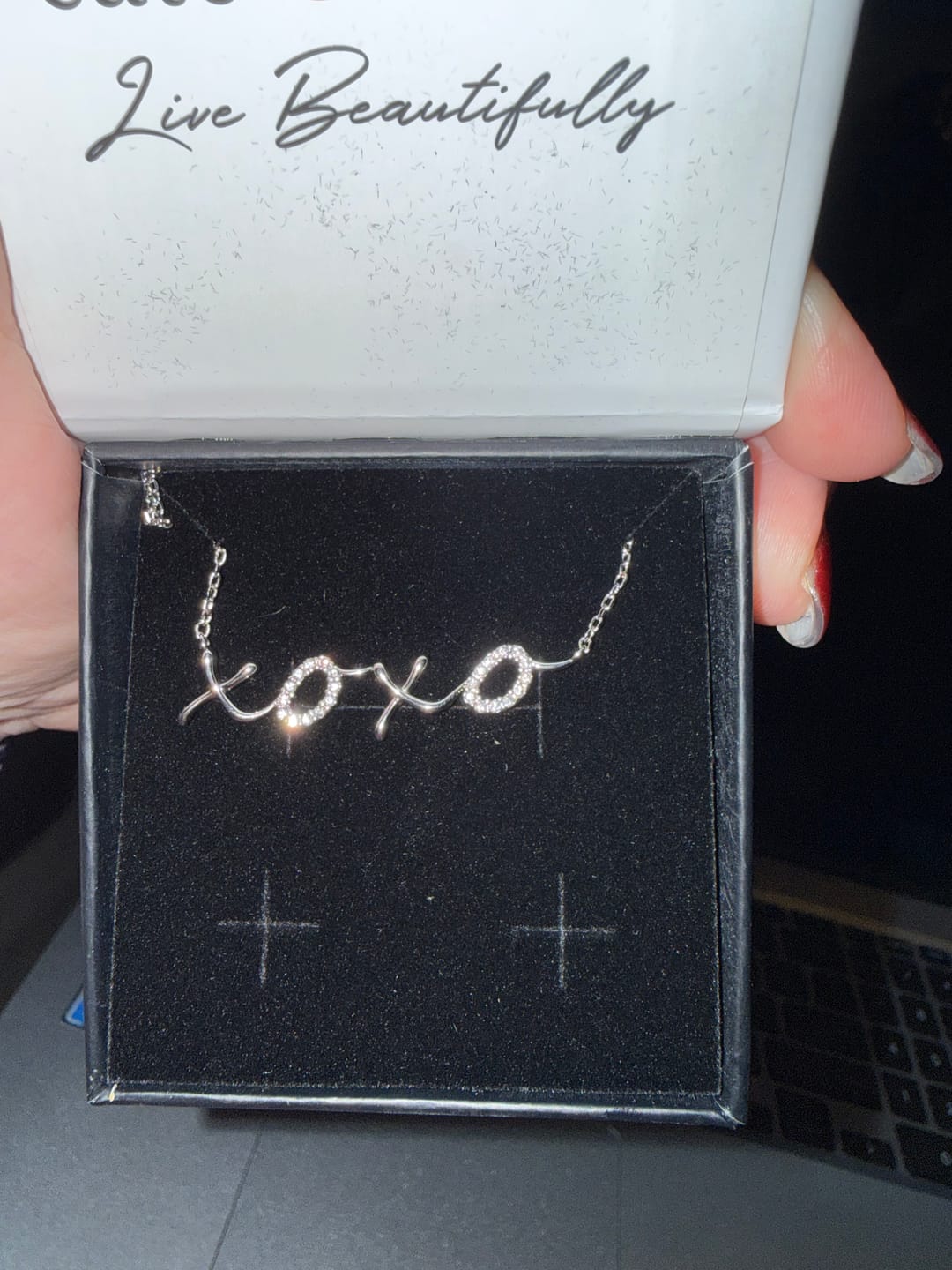 Customer photo review of Jocelyn 18k White Gold Plated XOXO Pendant Necklace with Swarovski Crystals