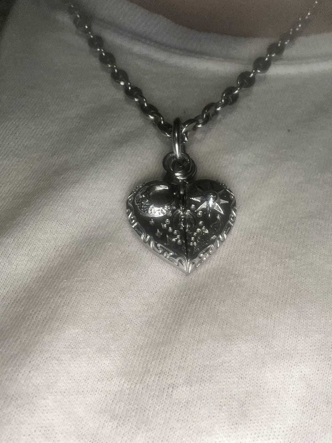 Customer photo review of COSMIC HEART PENDANT
