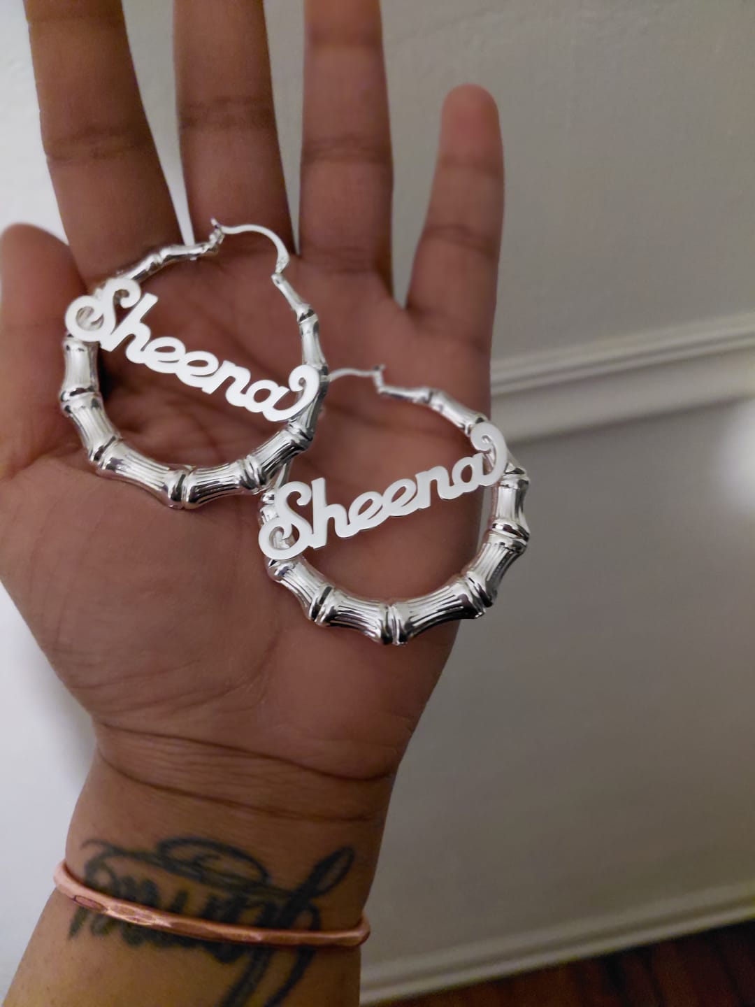 Customer photo review of 2" Bamboo Name Earrings