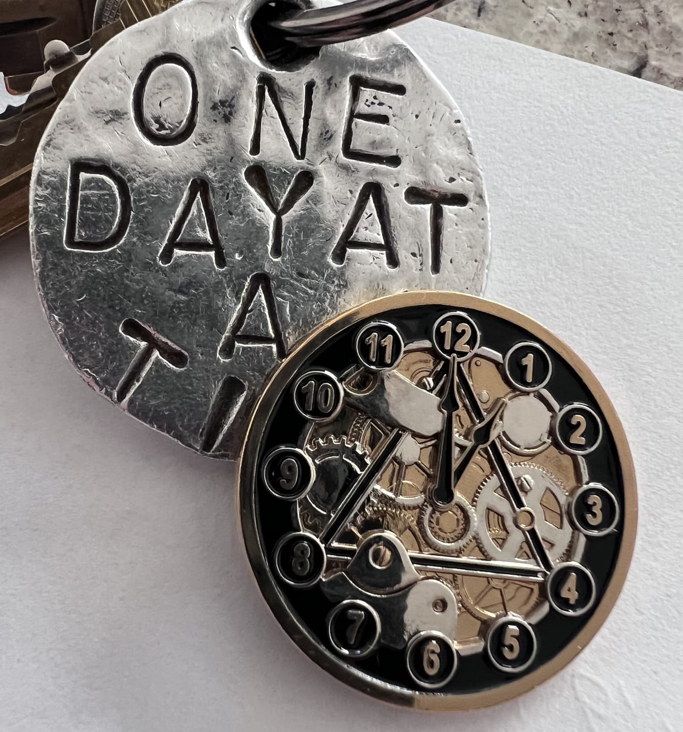 Customer photo review of Clockwork Gears AA/NA 3D Sculpted 12 Step Affirmation Recovery Medallion - Black / Gold / Nickel