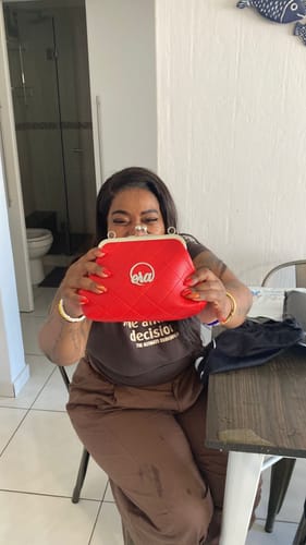 Customer photo review of ERA Mini Kisslock Chain Bag – Red