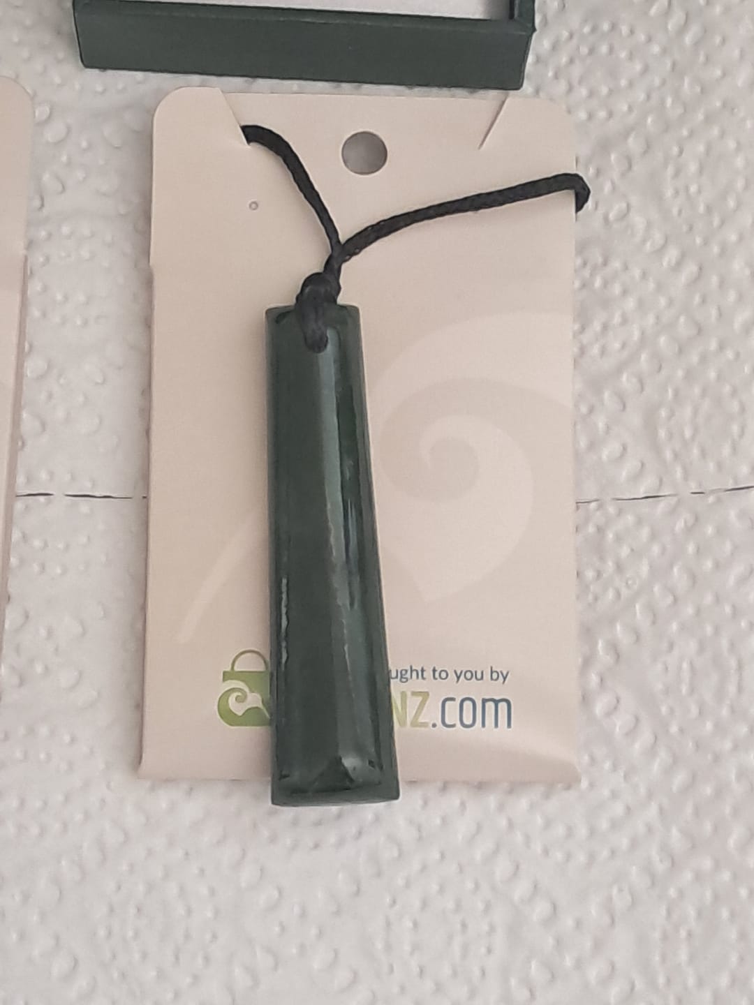 Customer photo review of Genuine NZ Greenstone 6cm Toki Necklace