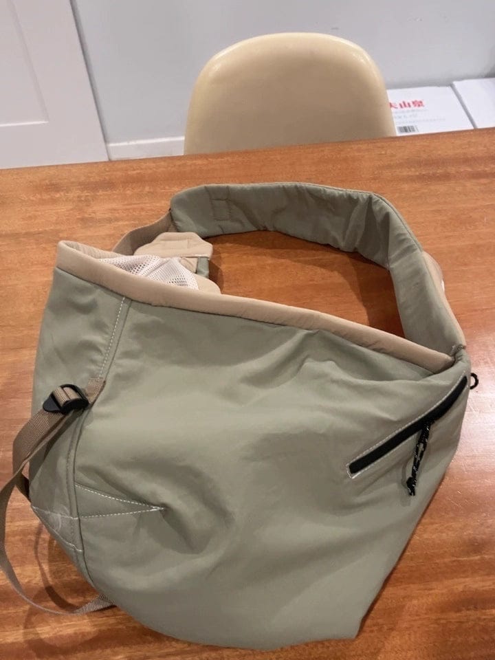 Customer photo review of Wide-Strap Cradle-Style Structured Pet Sling Carrier Bag