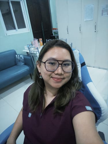 Customer photo review of Zip-Up Polo MoveTech® Scrub Top - Women / Merlot