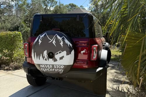 Customer photo review of Never Stop Exploring â€¢ Sasquatch Ford Bronco Spare Tire Cover Design