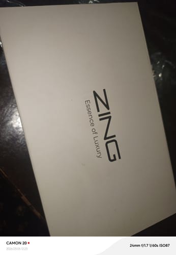 Reviewer's white box for the OUD Supreme BUNDLE, with 'ZING Essence of Luxury' logo.