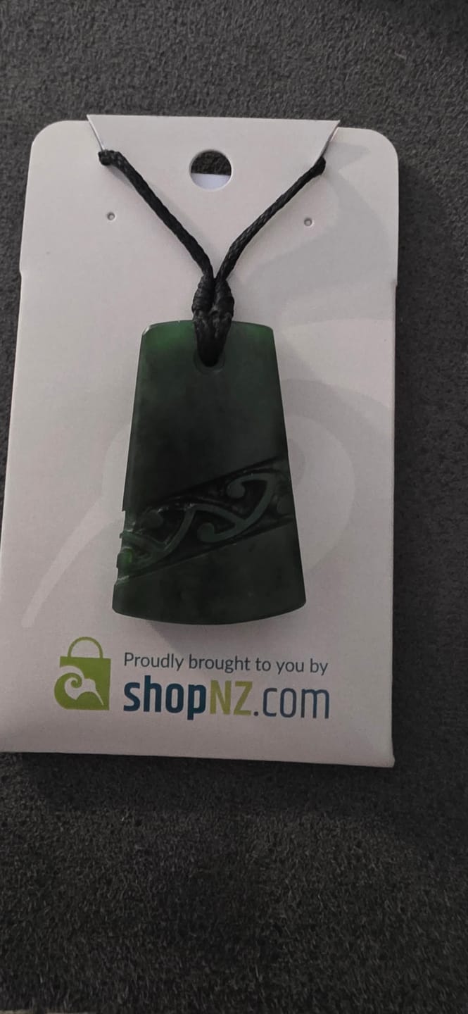 Customer photo review of Genuine NZ Greenstone Toki Necklace with Kowhaiwhai Carving