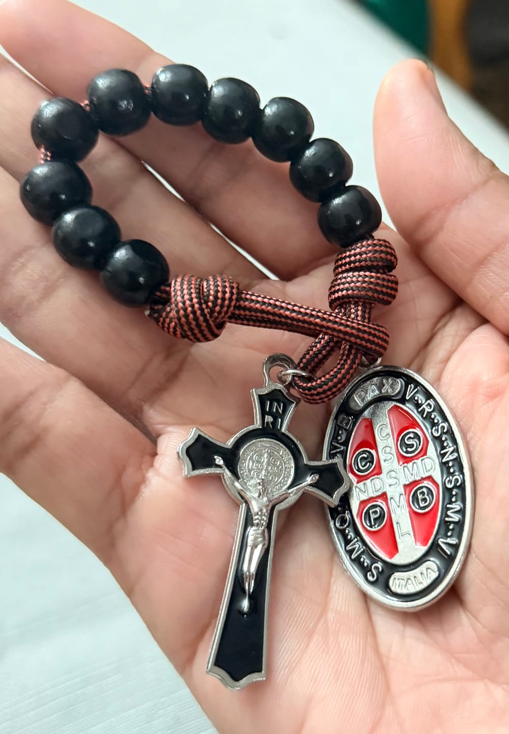 Customer photo review of Christianartworkshop Faith Defender Paracord Pocket Rosary with St. Benedict: Shield of Christ