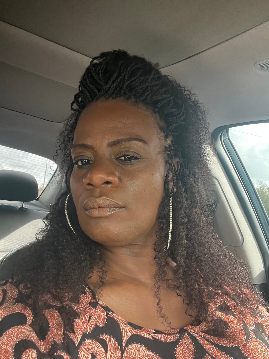 Customer photo review of Multi-Textured Kinky Curly Bulk Hair Extensions for Braiding