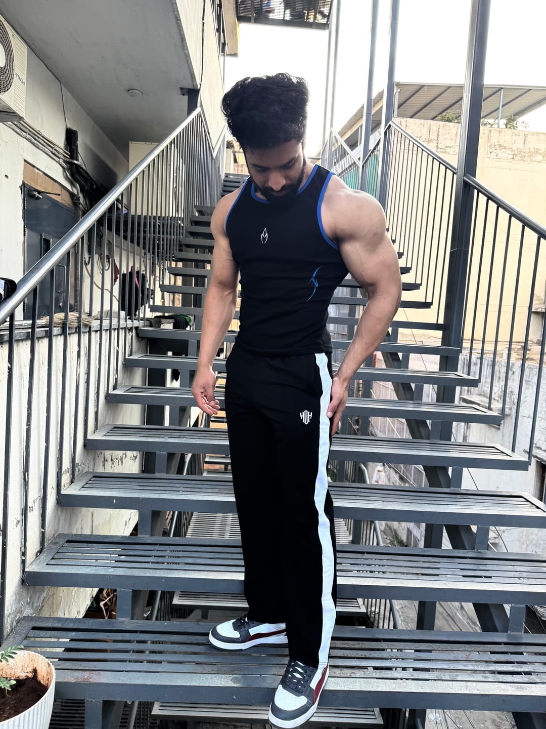 Customer photo review of PowerX Men Mid-Rise Track Pants  (Black)