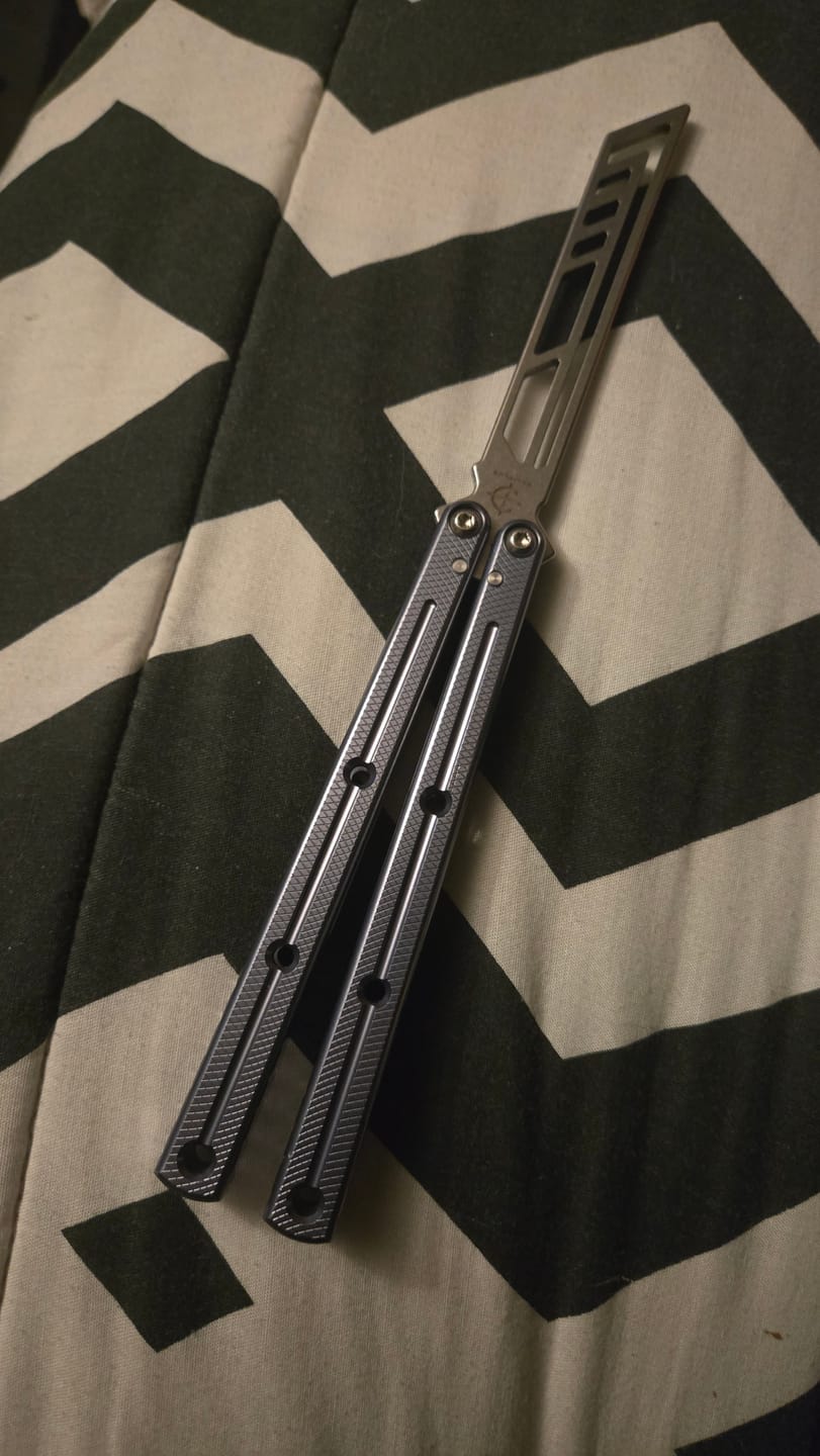 Customer photo review of baliplus 7075 kraken trainer Side slot version v3 clone Aluminum alloy handle stainless steel blade Bushing