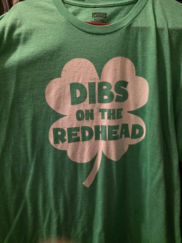 Customer's close-up of the green Dibs On The Redhead T-Shirt showing the shamrock graphic.