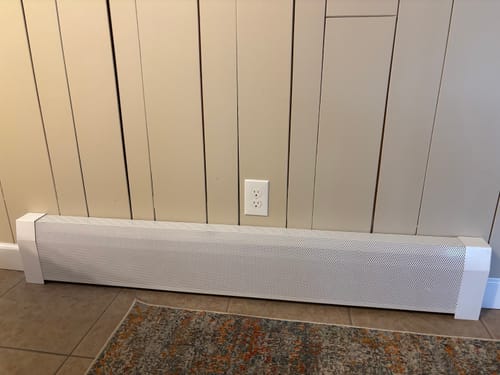 Customer photo review of Tall White Baseboard Covers by the Foot