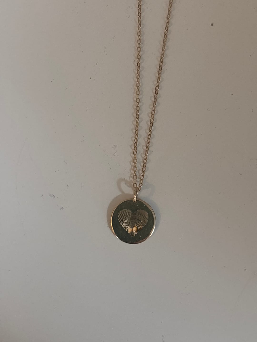 Customer photo review of Akela Medium Disk Necklace