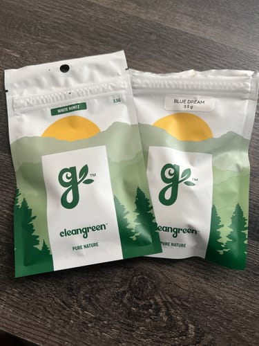 Customer showing two pouches from their Clean Green order: 'White Runtz' and 'Blue Dream'.