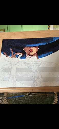 Customer's partially painted 'Woman with a Martini' paint by numbers canvas, showing the top half completed.