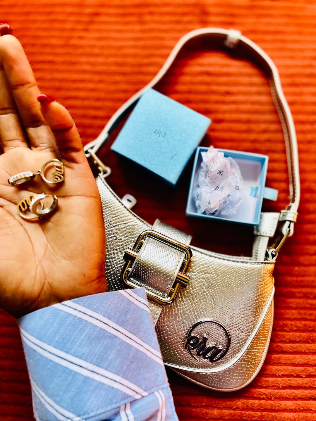 Customer photo review of Silver Precious Logo Earrings