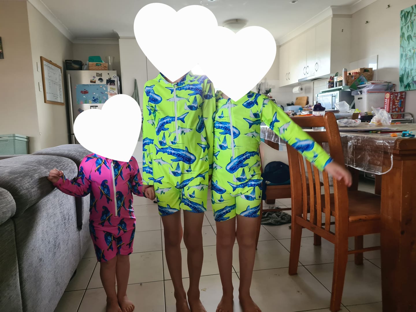 Customer photo review of Fluro Macaw Unisex Long Sleeve Zip Swimmers