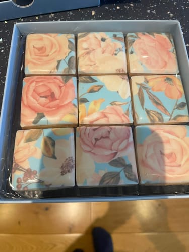 Customer's Floral Blooms Biscuit Box with nine beautiful biscuits, each with a detailed floral print.